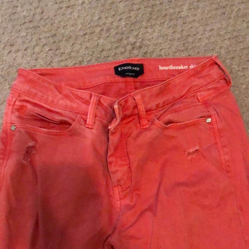 Orange orange /red pants